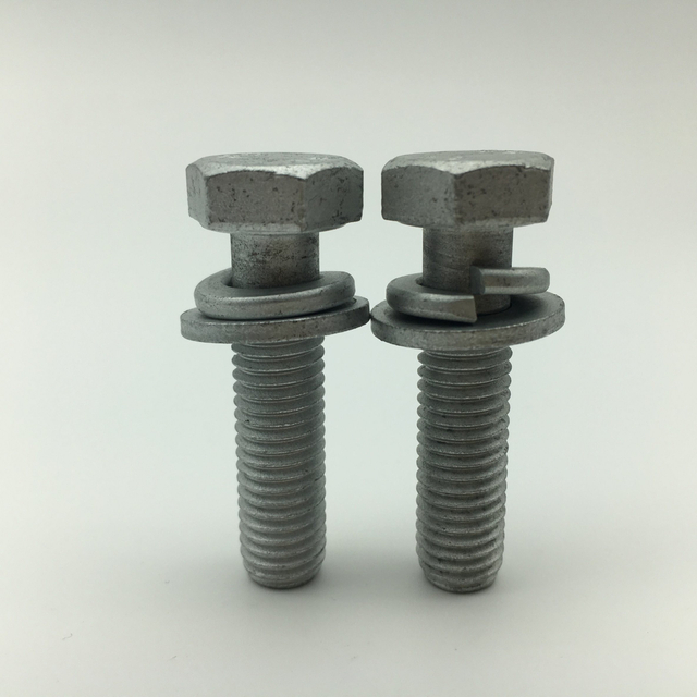 Pernos hexagonales con punta de perro y arandelas elásticas