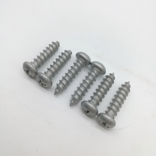 Tornillo autorroscante con accionamiento Phillips de cabeza plana Geomet 